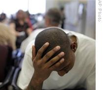 Dwayne Speller, 22, waits to talk to a job adviser in Las Vegas, Nevada, earlier this month. The nation's unemployment rate rose to 8.1 percent in February, the highest since late 1983.