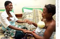 Two mothers in Malawi using kangaroo mother care