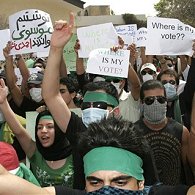 Hundreds of Iranian presidential candidate Mir Hossein Mousavi's supporters attend a protest, in front of the Iranian Consulate, in Dubai, Monday, 15 June 2009