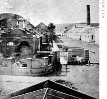 At left, the armory at Harpers Ferry