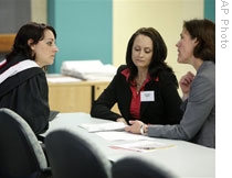 Just before graduation, a student explores job possibilities at Temple University's career center