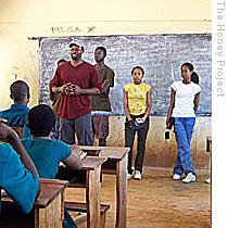 Nathan Burrell recruits student volunteers at one Agogo school to help gather and sell honey