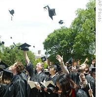 The goal of all that work: Caps are thrown in the air at the end of Brown University's graduation ceremony in Providence, Rhode Island.