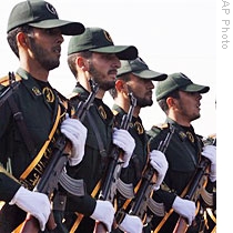 Iranian Revolutionary Guards members march during a parade ceremony outside Tehran (file photo)