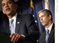 Education Secretary Arne Duncan listens as President Obama speaks in Washington last week