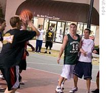 Students at the University of Tampa playing basketball