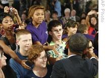 President Obama shakes hands with students after speaking at Wakefield High School in Arlington, Virginia