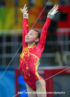 China's He Kexin reacts after the uneven bars competition during gymnastics artistic women's team final of the Beijing 2008 Olympic Games at National Indoor Stadium in Beijing, China, Aug. 13, 2008. (Xinhua)