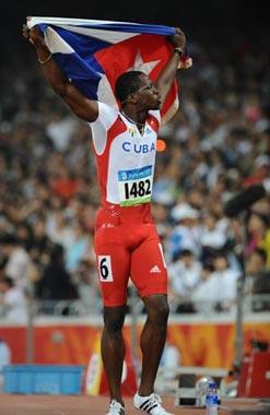 Dayron Robles of Cuba celebrates after the men's 110m hurdles final at the National Stadium, also known as the Bird's Nest, during Beijing 2008 Olympic Games in Beijing, China, Aug. 21, 2008. Dayron Robles won the title.(Xinhua Photo)