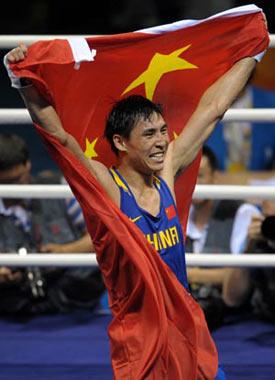 Zhang Xiaoping of China celebrates after defeating Kenny Egan of Ireland at the men’s light heavy (81kg) final bout at Beijing 2008 Olympic Games boxing event at Worker’s Gymnasium in Beijing, China, Aug. 24, 2008. Zhang Xiaoping won the gold medal of the event. (Xinhua Photo)