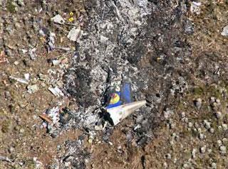 The general view of the crash site of Santa Barbara airlines airplane at the Andean mountains Feb. 22, 2008. All the 46 people aboard the Santa Barbara Airlines airplane died after the plane crashed on Thursday in Venezuela's Andean region. (Xinhua/AFP Photo)