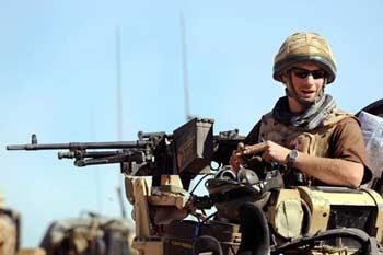 Britain's&nbsp;Prince&nbsp;Harry&nbsp;sits&nbsp;in&nbsp;his&nbsp;position&nbsp;in&nbsp;a&nbsp;Spartan&nbsp;armoured&nbsp;vehicle&nbsp;in&nbsp;Helmand&nbsp;province,&nbsp;southern&nbsp;Afghanistan&nbsp;February&nbsp;18,&nbsp;2008.&nbsp;(Xinhua/Reuters&nbsp;Photo)
