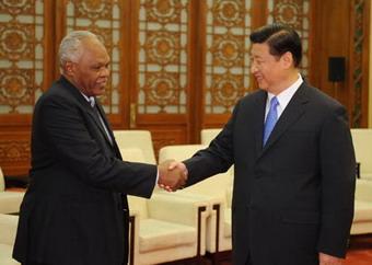 Chinese Vice President Xi Jinping (R) shakes hands with Awad Ahmed Al-Jaz, envoy of Sudanese President, during their meeting at the Great Hall of the People in Beijing, capital of China, on July 29, 2008. (Xinhua/Li Xueren)