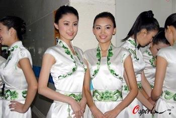 Ceremony hostesses of the 29th Olympic Games pose for a photo in Beijing, July 21, 2008.(File Photo)