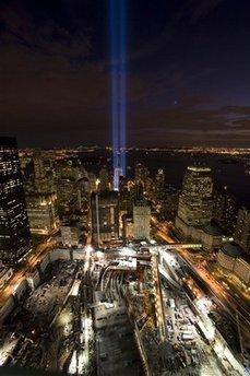 A short test of the 'Tribute in Light' illuminates the sky over the World Trade Center site Wednesday, Sept. 10, 2008 in New York. The Tribute in Light will be turned on for the evening of Thursday, Sept. 11, in honor of those who lost their lives seven years ago in the terrorist attacks on the United States.(AP Photo/Mark Lennihan)